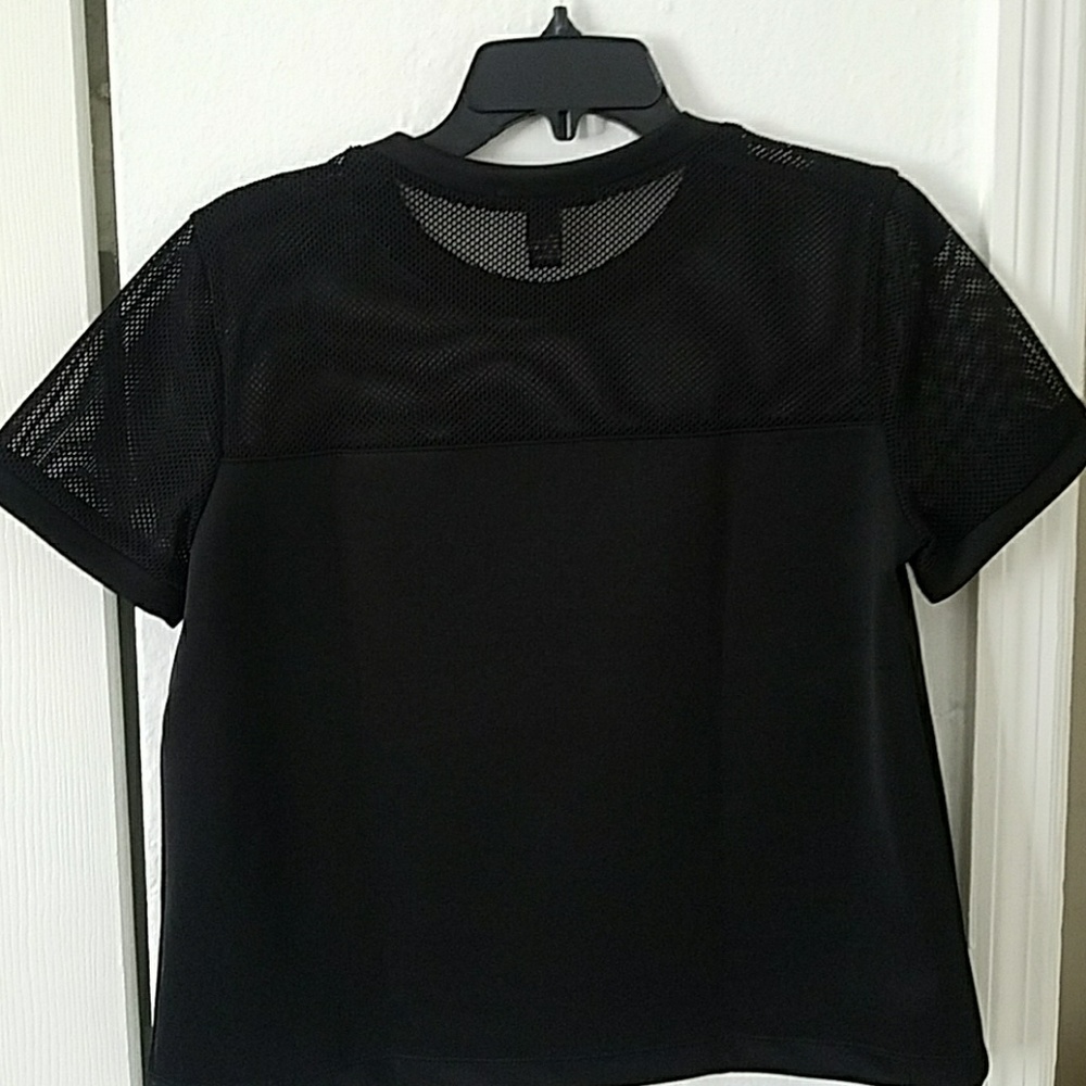 NWOT black t-shirt, shoulders are netted - Picture 2 of 2